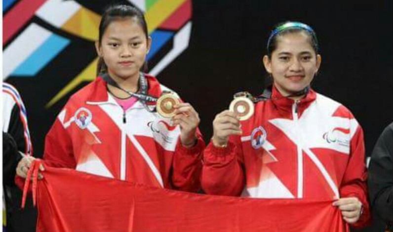 Pasangan Leani Ratri Oktila/Khalimatus Sadiyah mempersembahkan medali emas pertama bagi kontingen Indonesia di ajang Parilimpiade Tokyo 2020. 