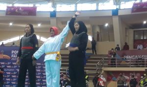 Atlet pencak silat asal Provinsi Sumatera Utara Rizka Andini yang juga sang juara dunia berhasil menyingkirkan wakil tuan rumah Rinindah IIN L pada laga Pekan Olahraga Nasional (PON) Papua di Gedung Olahraga (GOR) Toware Kabupaten Jayapura